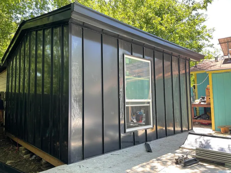 Black standing seam metal wall panels for Metal Roof Installation in Shorewood