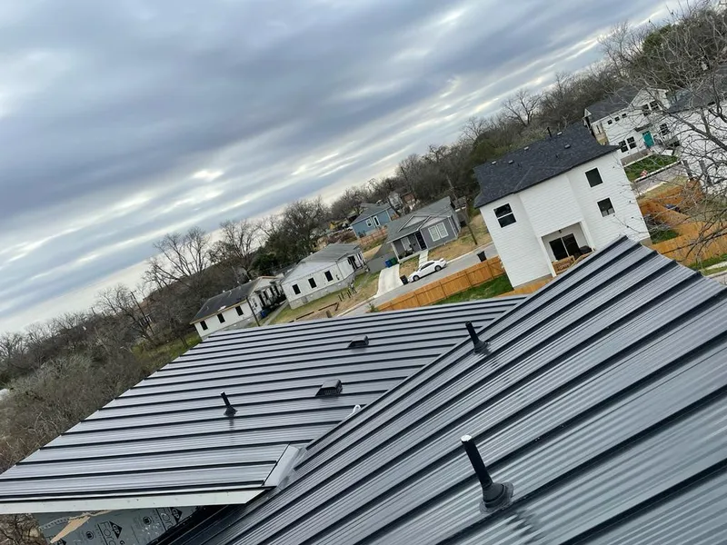 Standing seam metal roof panels with vents for Skylight Repair in Shorewood